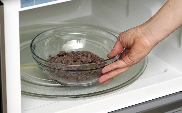 Place your plastic bowl with the cut-up chocolate into the microwave and heat for 30 seconds